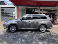 Mitsubishi Outlander 2.4 PHEV Instyle | Leder | Schuif/Kanteldak | 360 Camera | Adap.Cruise | All-in rijklaarprijs Foto