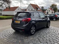 Kia Venga 1.6 CVVT Platinum Edition | Schuif/Kanteldak | Navi | Camera | ALL-Season | Keyless | All-in rijklaarprijs Foto