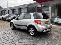 Suzuki SX4 1.6 Comfort | 16" LMV | Trekhaak | ALL-Season | Keyless | Stoelverw. | Dealer onderh. | All-in rijklaarprijs Foto